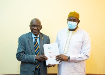 The Gambia President Adama Barrow receives the final Truth, Reconciliation and Reparation Commission, TRRC Report handed to him by the the TRRC Chairman, Dr. Lamin J Sise. Photo: TRRC Facebook