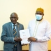 The Gambia President Adama Barrow receives the final Truth, Reconciliation and Reparation Commission, TRRC Report handed to him by the the TRRC Chairman, Dr. Lamin J Sise. Photo: TRRC Facebook
