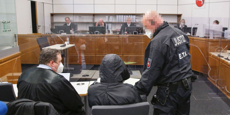 Bai Lowe, a former member of the Junglers, a Gambian death squad, in court in Celle, Germany, during his trial for crimes against humanity. Photo credit: AFP.